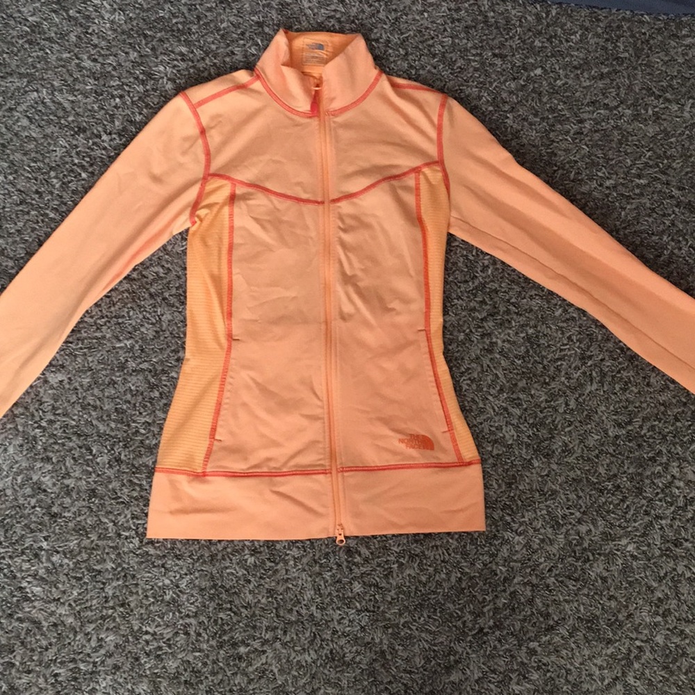 Women’s orange North Face jacket